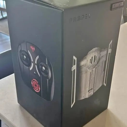 Drone shipping box with controller graphic and side panel