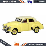 Light yellow two-tone FJ Holden sedan diecast model, front three-quarter view