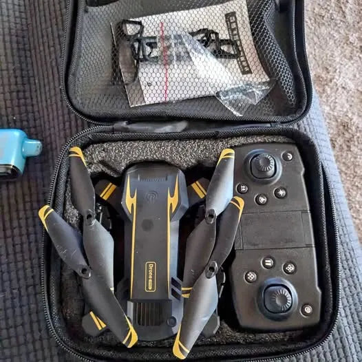 Drone and remote controller in zippered case with accessories