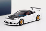 White and black 1:64 diecast sports model car with rear wing and front splitter