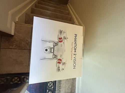 Phantom 2 Vision drone retail box with illustrated quadcopter and text