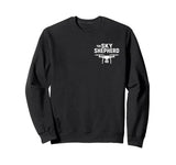 Black sweatshirt with “The Sky Shepherd” drone graphic on the chest