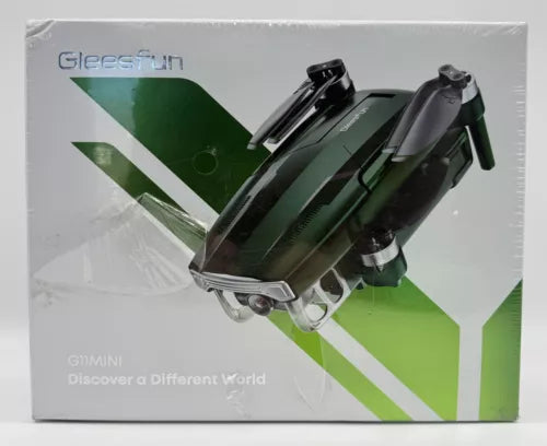 Green mini camera drone with foldable propellers, shown on product box packaging
