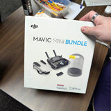 DJI Mavic Mini bundle kit box with drone, controller, and accessories shown