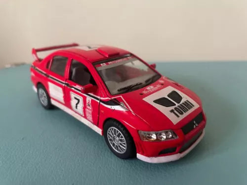 Kinsmart Mitsubishi Lancer Evolution VII diecast rally car, 1:36, red with white hood