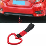 Heart-shaped keychain with red metal heart and black strap