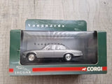 Silver 1:43 diecast car model in retail box with Jaguar branding
