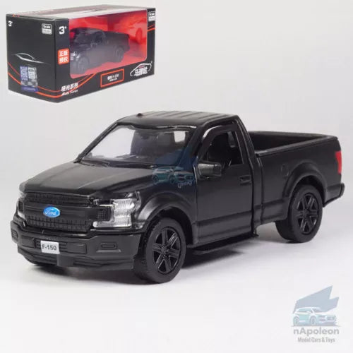 Matte black diecast pickup truck model car with black wheels and chrome grille