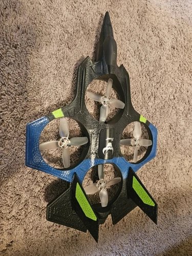 Black and gray quadcopter drone with four propellers and green accents