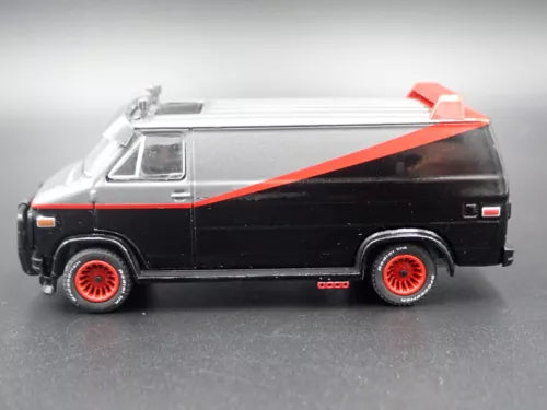 Black diecast van model with orange diagonal stripe, side view, red wheel rims.