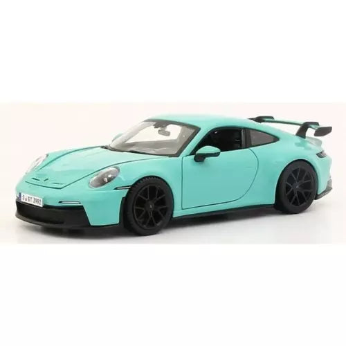 Mint green diecast mini car, front 3/4 view with black wheels and windows