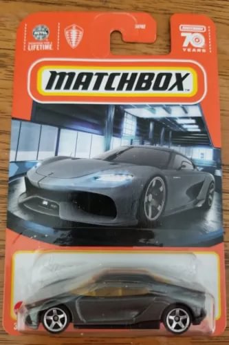 Gray Matchbox diecast supercar in clear blister package, front three-quarter view