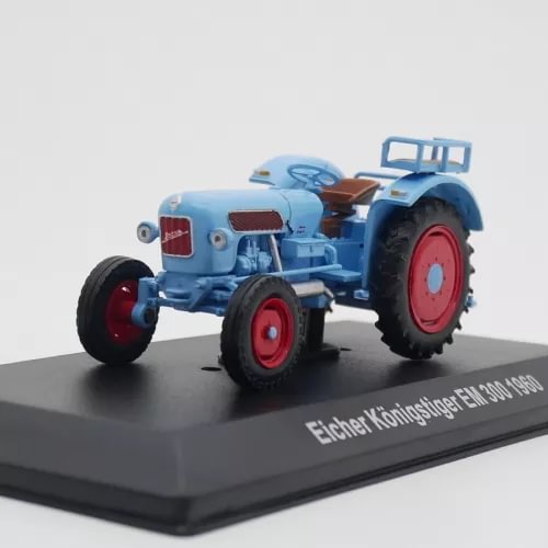Diecast farm tractor model, light blue body with red wheels and steering details