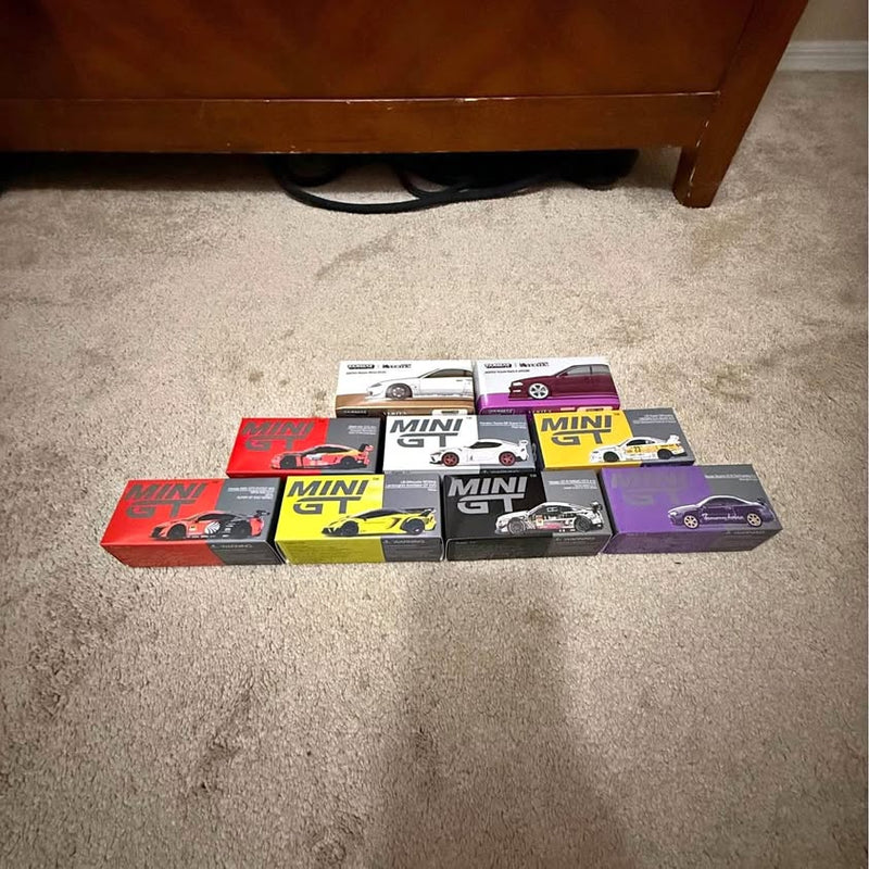 Mini diecast car box set with multiple colored packaging