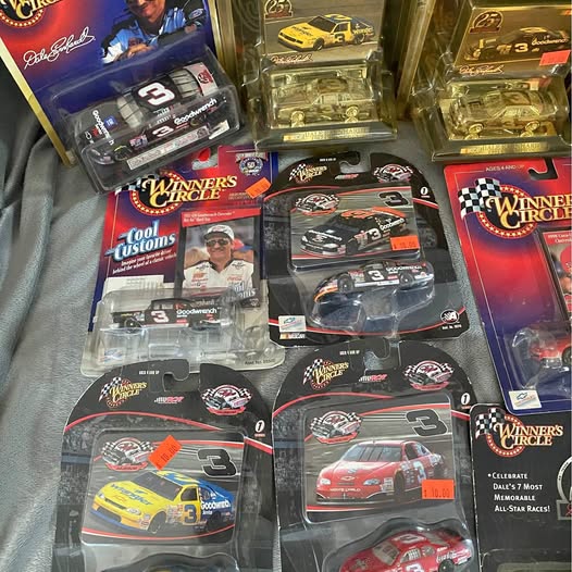 Diecast race car model set in retail packaging, multi-car with racing branding