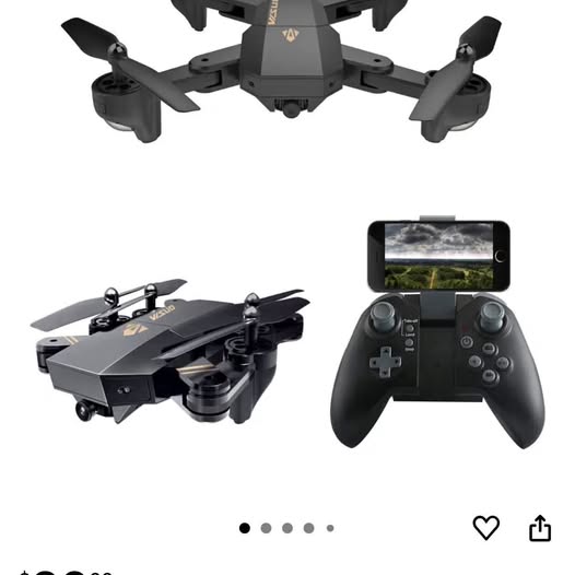 Black and gold quadcopter drone with camera, four rotor arms and controller view