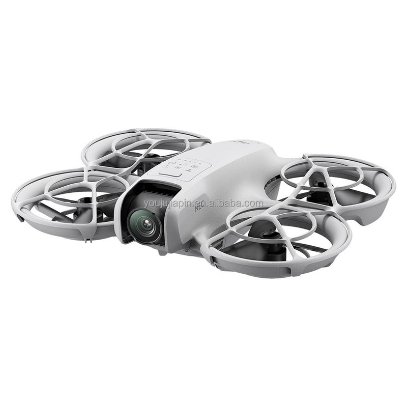 DJI NEO drone with four gray propellers and front camera, compact white quadcopter