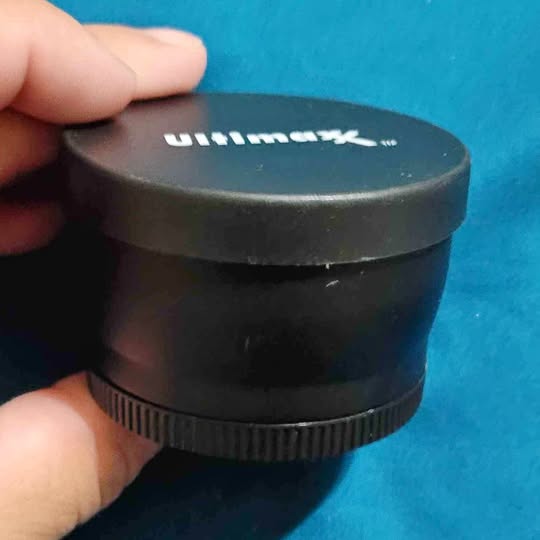Ultimaxx 58mm telephoto lens front cap with ridged adjustment ring, black