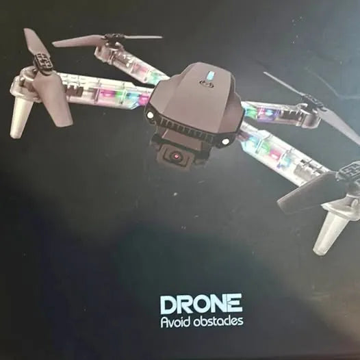 Quadcopter drone with four propellers and front camera/sensors