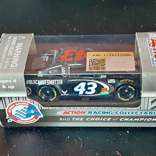 Racing diecast model car, dark blue with #43 and #BlackLivesMatter on box