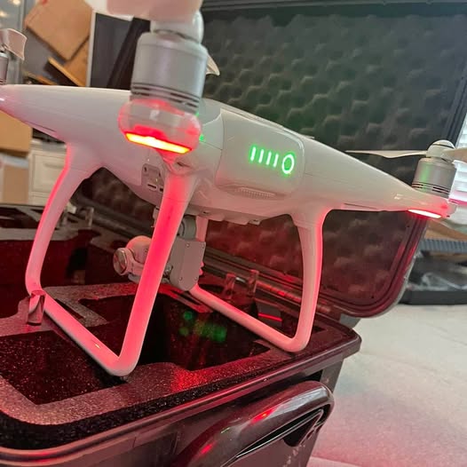 DJI Phantom 4 Hockley TX drone with front camera and red landing lights
