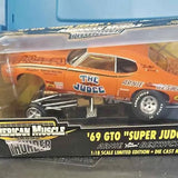 Orange 1969 GTO Super Judge diecast model car in clear display box