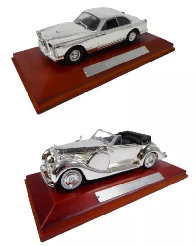 Diecast classic car set, two silver models on wooden display bases
