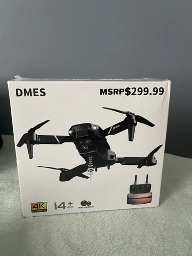 Drone 23 drone retail box with quadcopter graphic and MSRP $299.99, 4K