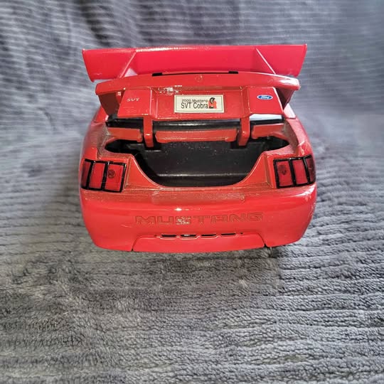 1:18 scale SVT Cobra diecast Mustang, red rear view with spoiler