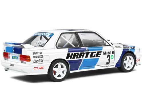 White BMW E30 M3 Gr. A diecast race car with blue stripe and number 3 on door