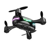 Quadcopter drone with rainbow LED lights and 4-blade propellers
