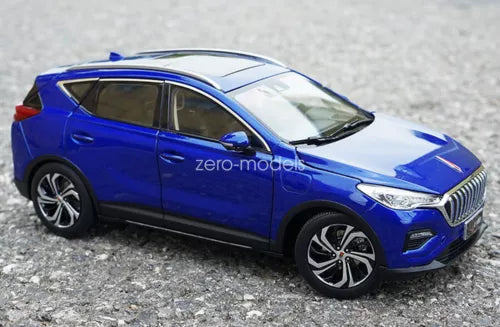 Blue SUV diecast model car in front three-quarter view, black wheels and grille