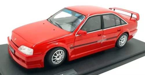Red 1990 Opel Omega EVO500 diecast sedan model, front three-quarter view