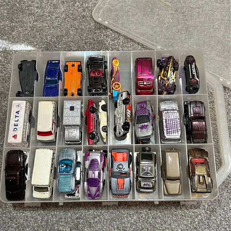 Diecast car storage case with many toy cars in compartments, mixed colors and styles
