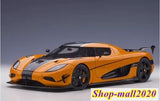 AUTOart 1:18 diecast model sports car, orange and black, front 3/4 view