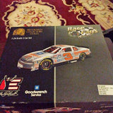 Diecast race car 1:24 set in display box with two cars and branding