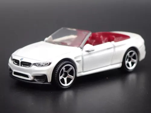 BMW M4 convertible diecast model car, white, front 3/4 view