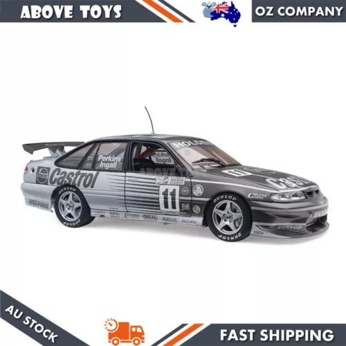 1:18 diecast race car, white body with black hood and number 11 on doors