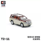 Red and cream diecast SUV model car with open detail grille and wheels