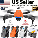 Orange quadcopter drone with four rotors and camera gimbal