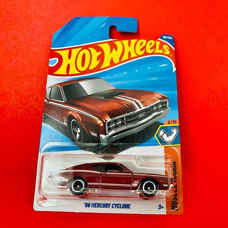 Hot Wheels 1969 Mercury Cyclone diecast car in red on retail blister pack