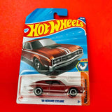 Hot Wheels 1969 Mercury Cyclone diecast car in red on retail blister pack