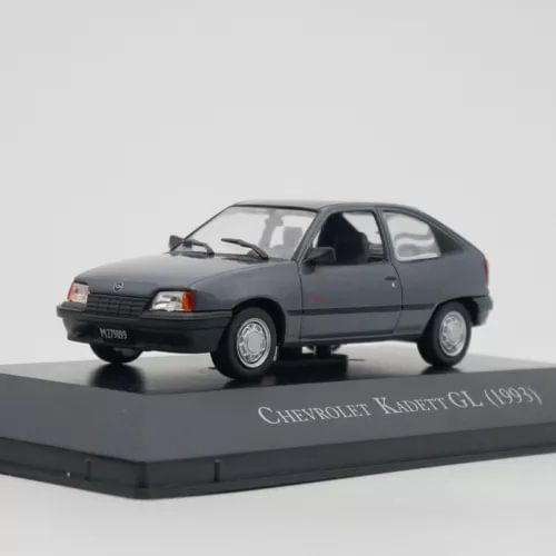 Diecast car model: dark gray Chevrolet Kadett GL 1993 with metal body and wheels