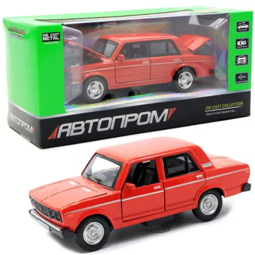 Red Soviet classic die-cast model car with chrome grille and black interior
