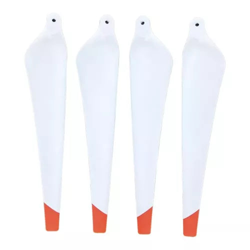 Set of 4 white drone propeller blades with red tips and mounting holes