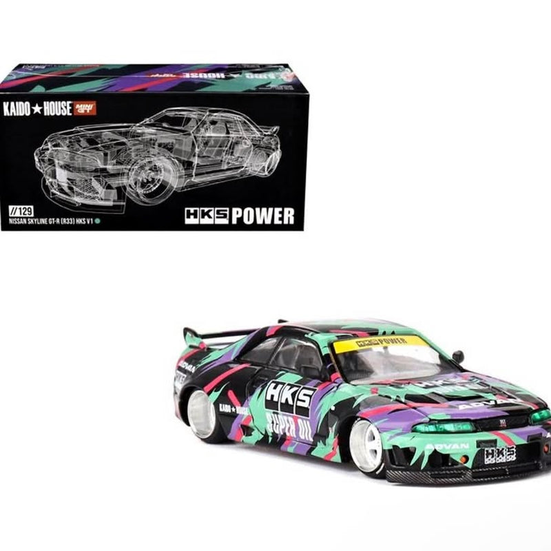 Diecast sports car model with green and black HKS livery, pink accents