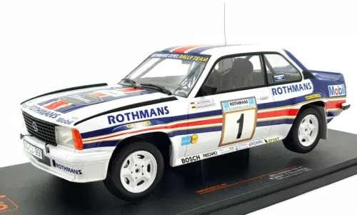 Diecast race car model, white with blue/red stripes, number 1 on front fender