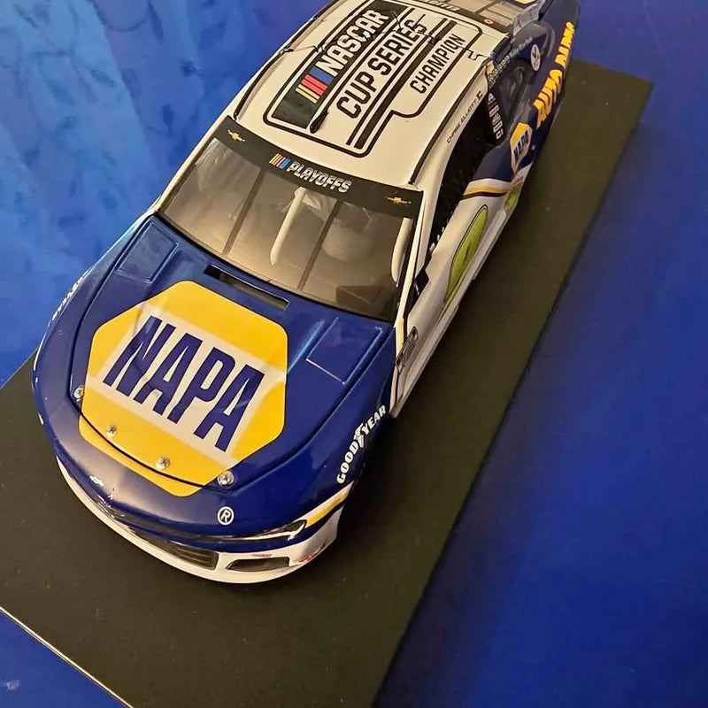 Blue and yellow diecast race car with Mapa logo, front angled view.