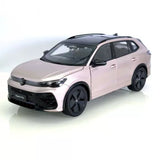 1:18 diecast Volkswagen Tiguan L model SUV, light pink with black wheels