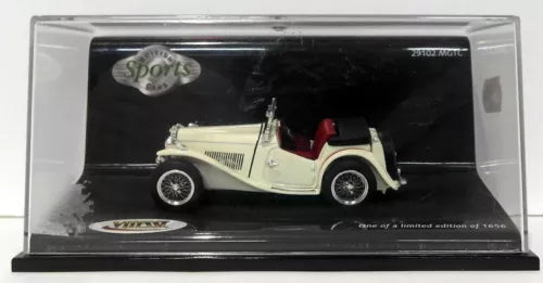 Cream MGTC diecast car model in display case